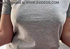 Italian MILF smokes outdoors, big tits exposed!