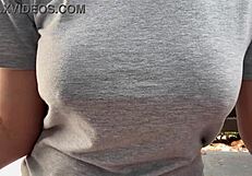 Italian MILF smokes outdoors, big tits exposed!