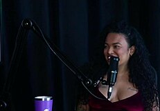 Blonde glamour model in sheer red lingerie