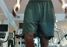 Sexy Mature Woman Performs Pole Dance in Gym Dorm