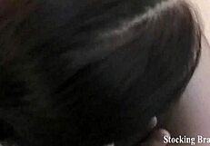 She licks wet toes in stockings.