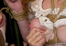 Three redhead lesbians engage in kinky anal submission and domination with bondage