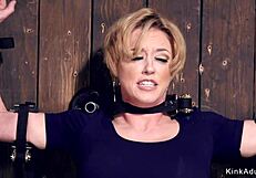 Hey, wanna see this busty milf gagged and clamped in bondage?