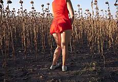 Hot milf in short skirt teases her sexy thong ass outdoors