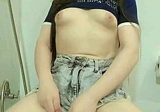 amateur young teen girl masturbates in the bathroom