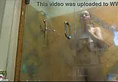 jelena jensen steps out of the shower and shakes her big natural tits seductively