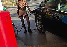 flashing at a petrol station in public outdoor area