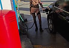 flashing at a petrol station in public outdoor area