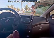 risky masturbation inside a car in public for a hot babe bent over.