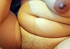 Beautiful Latina girl goes wild masturbating with a cucumber in bedroom.