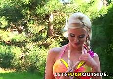 hot blonde bimbo in bikini fucks outdoors with big fake tits
