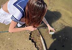 young petite girl in uniform moans while fishing outdoors after school