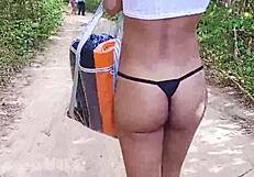 Hairy Babe Strolls Topless in Thong Through Forest Trails