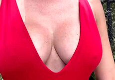 Italian mommy milf walks outdoors with big boobs on display