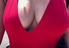 Italian mommy milf walks outdoors with big boobs on display