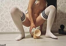 Brunette Jumps On Big Dildo In Oil For Anal