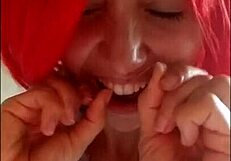 Chantal demonstrates proper tooth brushing and filling mouth with toothpaste in close up