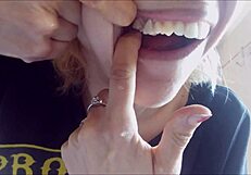 Chantal demonstrates proper tooth brushing and filling mouth with toothpaste in close up