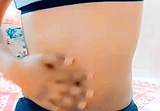 Feminine participant exercises in tight outfit during workout