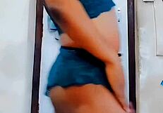 Feminine participant exercises in tight outfit during workout