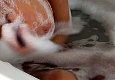 Natally Gold bent over in bathtub for hard doggystyle quickie with monster cock.