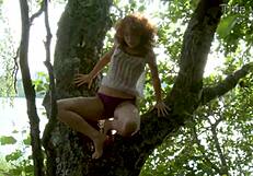 Ginger teen 18+ pamela e feels the thrill of self-smashing her shaved pussy on outdoor branches.
