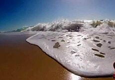 Lucy's relaxing day at the nude beach.
