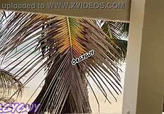 Hey, that ebony wife is flashing her pussy right at the beach house, feeling so bold outdoors