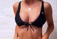 Boutinela shows off in all black bikinis, focusing on her ass.