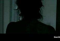 Does Juliette Binoche tease with her big tits in this topless scene?