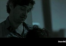 Does Juliette Binoche tease with her big tits in this topless scene?