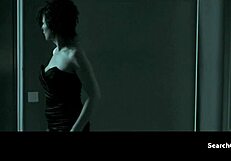 Does Juliette Binoche tease with her big tits in this topless scene?