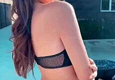 Boutinela shows off in all black bikinis, focusing on her ass.