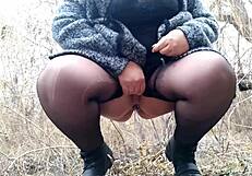 Plump mother-in-law's hand teases wet pussy