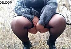 Plump mother-in-law's hand teases wet pussy