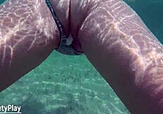 This creampie whore is swimming underwater with a big ass. 😎