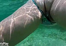 This creampie whore is swimming underwater with a big ass. 😎