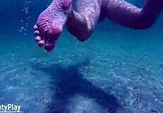 This creampie whore is swimming underwater with a big ass. 😎