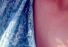 Mature Model Strolls Along the Beach in a Relaxed Manner