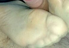 Homemade footjob with tan stockings, oops