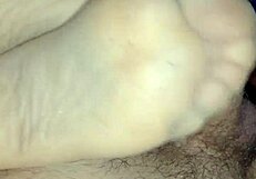 Homemade footjob with tan stockings, oops