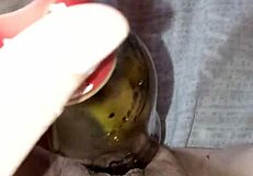 Hey, isn't Gretala the pregnant one rubbing a bottle on her juicy muscular pussy lips?