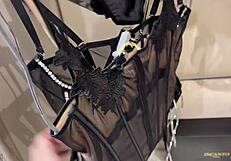 Is she masturbating in the changing room while trying new underwear?