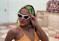 Brunette gives footjob and gets messy