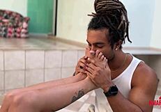 Brunette gives footjob and gets messy