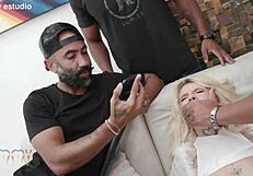 Kyra has fun with a baseball bat and chocolate treats at the party