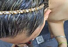 The stepmom delivers unforgettable blowjobs to her stepson outdoors.