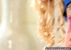 Hot masseuse with big tits and tattoo rubs pussy during lesbian massage