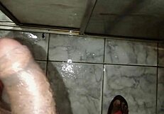 Person masturbating in the bathroom