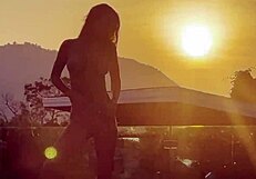 Monika Fox performs blowjob and rimming, ending with golden shower in pool at sunset.